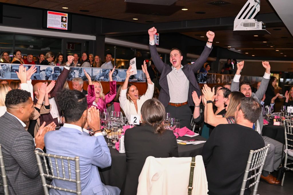 A group of people celebrating.