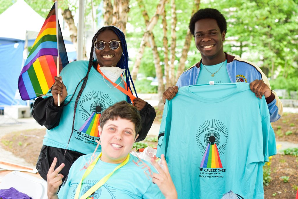 A group of individuals smiling at the camera.