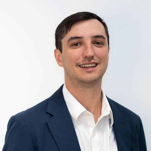 Man smiling at the camera.