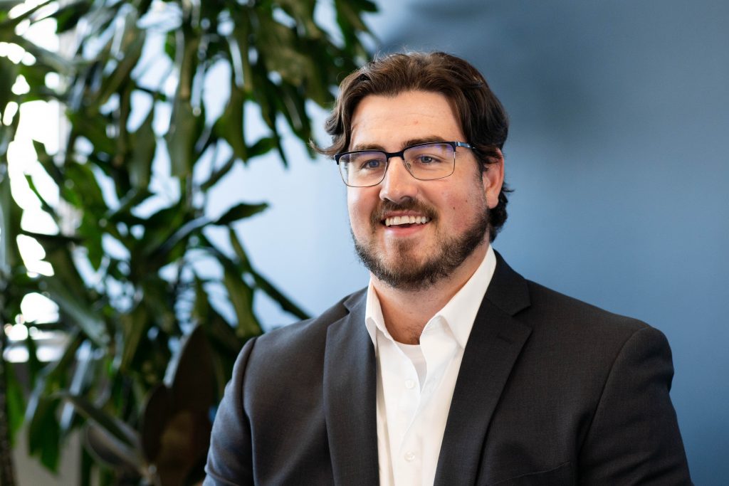 Man smiling at the camera.