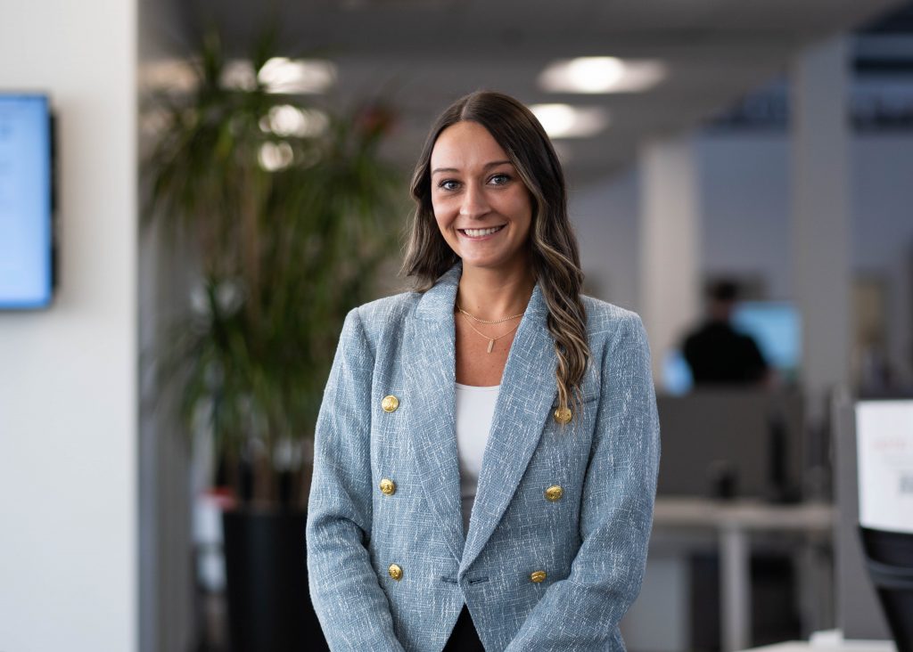 Woman smiling at the camera.