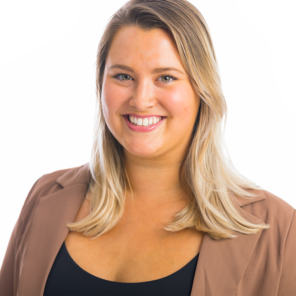 Woman smiling at the camera.