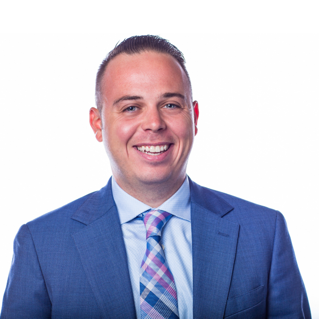 Man smiling at the camera.