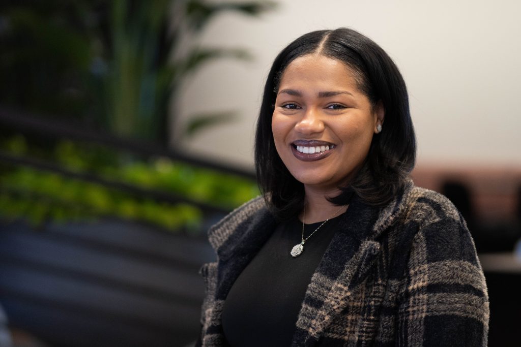 Woman smiling at the camera.