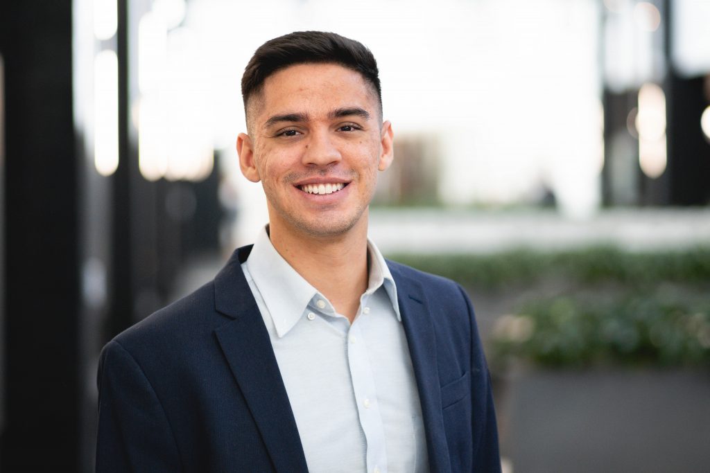 Man smiling at the camera.