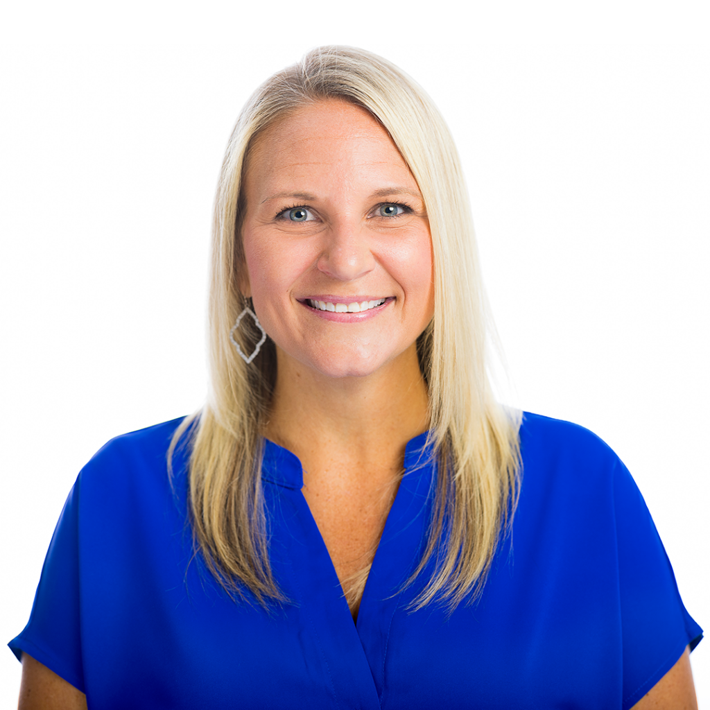 Woman smiling at the camera.