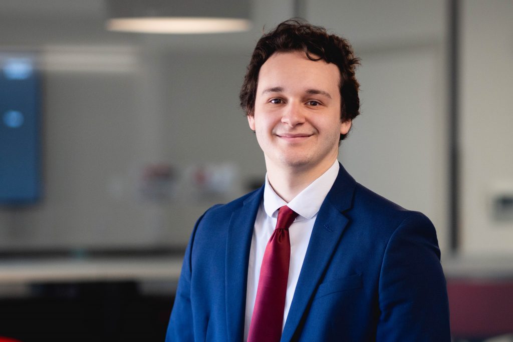 Man smiling at the camera.