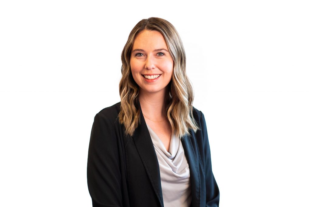 Woman smiling at the camera.